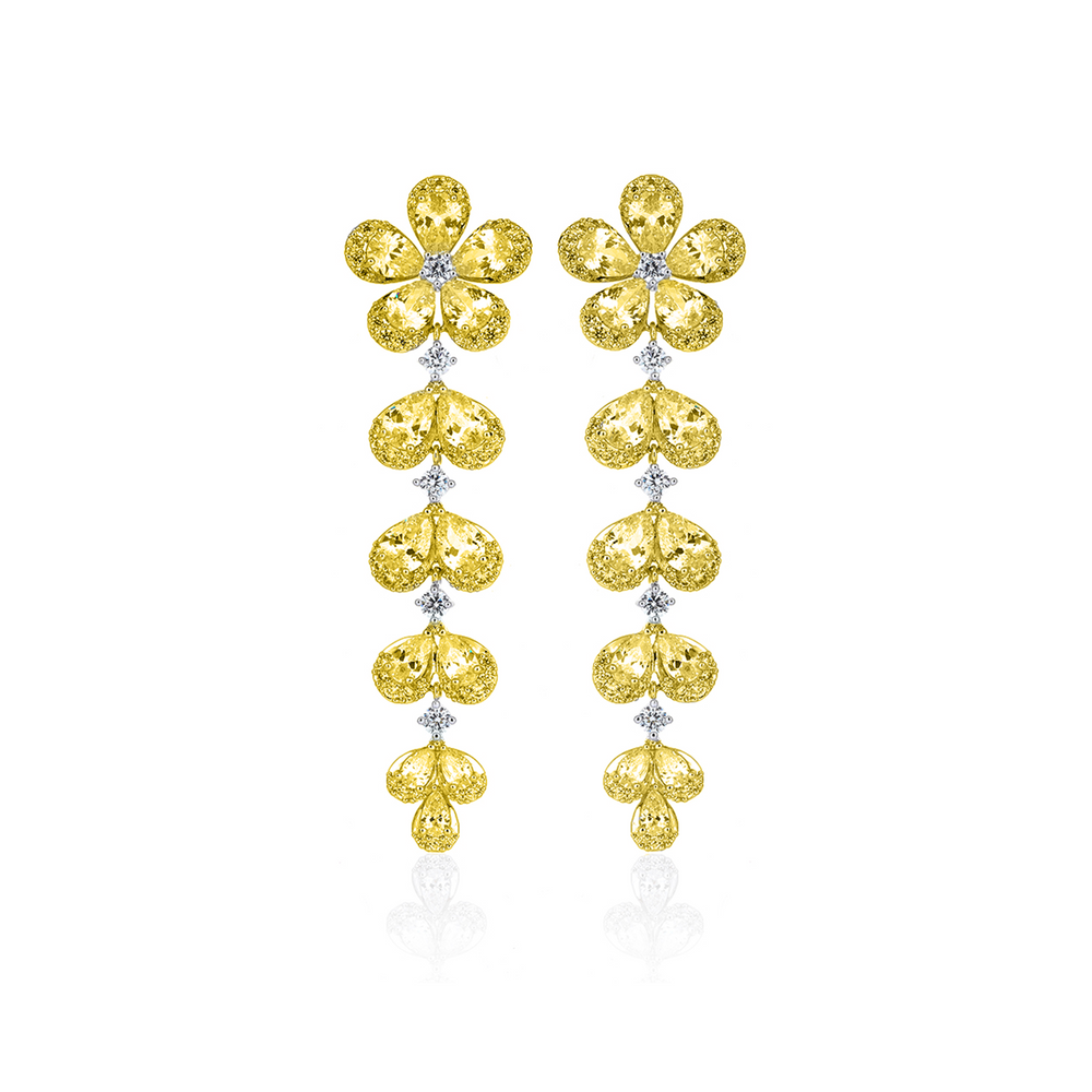 7 orecchini in oro ibrido diamantato karat