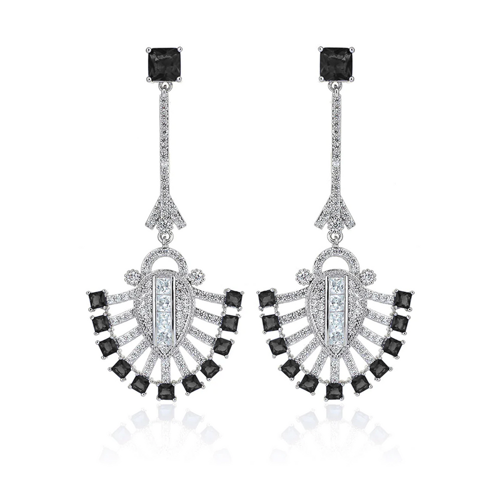 7 boucles d'oreilles en or hybride de diamant Karat