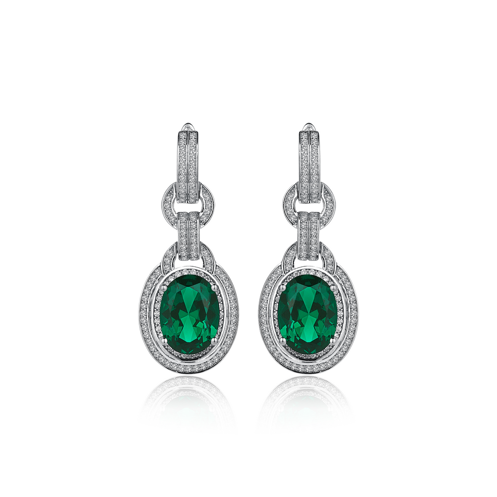 10 orecchini in oro ibrido con diamante karat