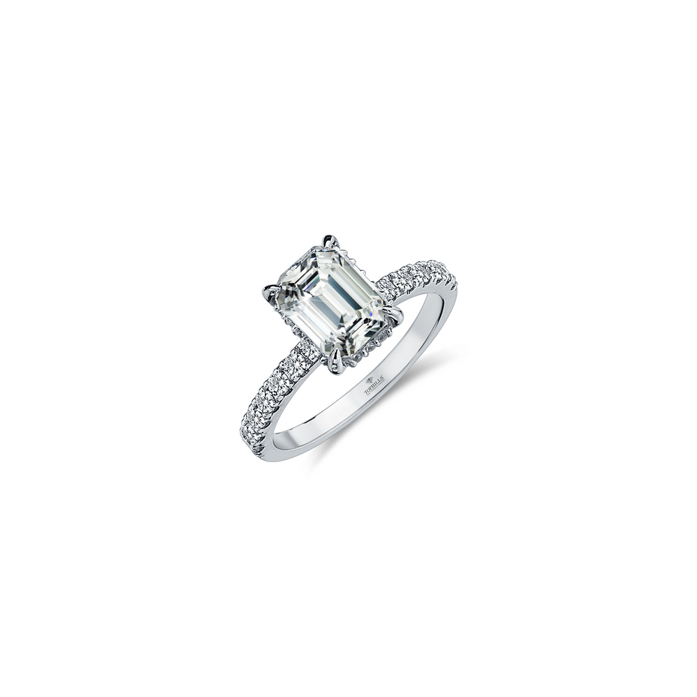 Emerald Cut Diamond Solitaire Ring with Stones on the Sides
